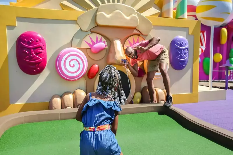 crave-rooftop-mini-golf-slide-6