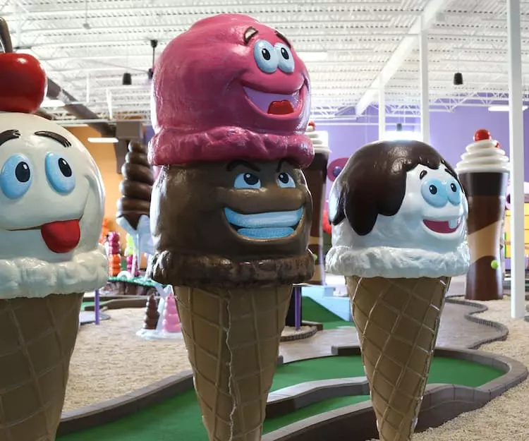 giant ice cream cones with faces